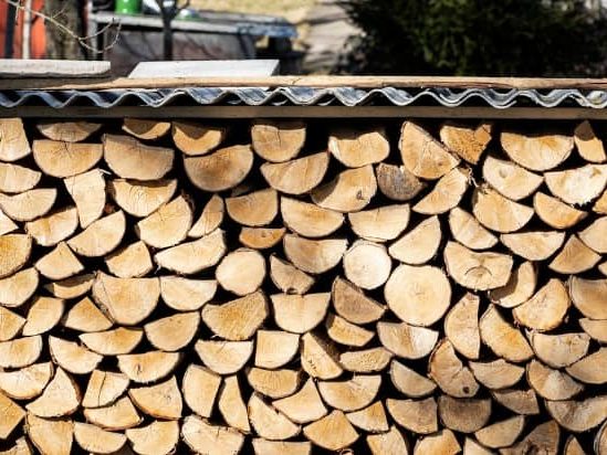A face cord of wood in a log store