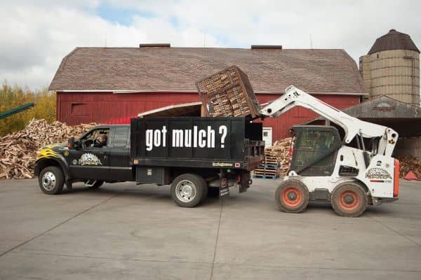 Loading a truck with firewood