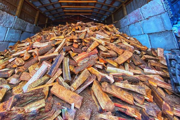 A pile of kiln-dried firewood logs