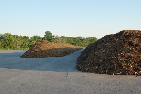 Two piles of bulk mulch for sale