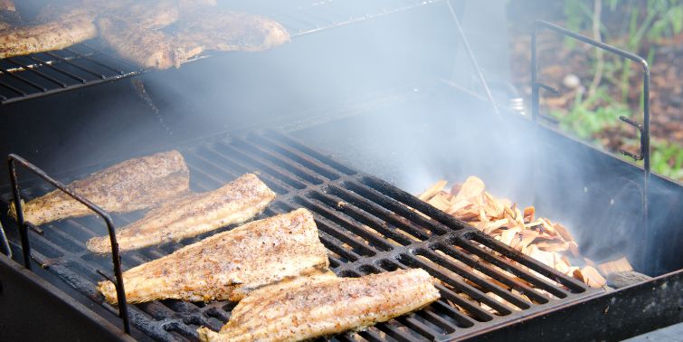 Meat cooking on smoker